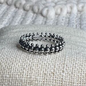 Continuous Pattern Sterling Silver Band Ring
